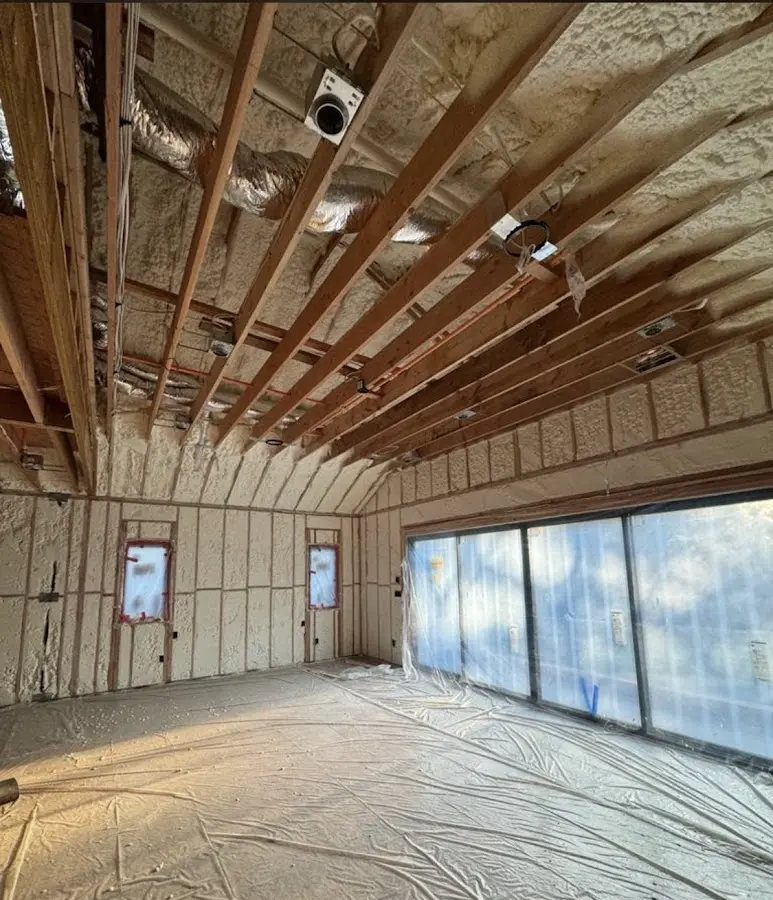 Interior walls and ceiling insulated with spray foam during new construction in Hastings